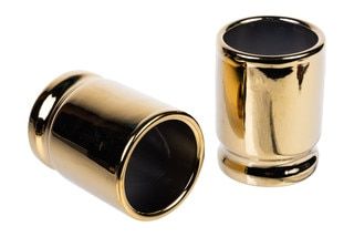 Caliber Gourmet Set of 2 50 Caliber Shot Glasses are made of ceramic.